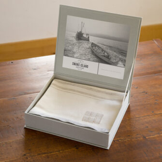 Swans Island Company's Grace Throws come in this beautiful linen gift box.