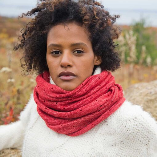 Swans Island Company's Coastal Cowl. Soft and silky, hand-dyed merino wool silk. This luxurious infinity loop is designed in Maine and knit in USA with hand-dyed yarns. Shown here in Currant red.