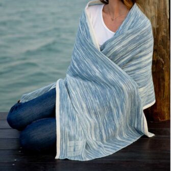 Swans Island Boothbay Wraps. Handwoven with a soft merino wool / silk blend. Made in Maine. Shown here in Ikat Indigo + Natural color,