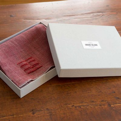 Swans Island handwoven Camden Scarf in custom grey linen gift box.
