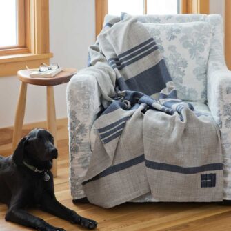 Swans Island Company - Island Throw - 100% wool from Maine island sheep. Handwoven in Grey with Midnight Blue.