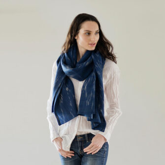 Swans Island Handwoven Firefly Wrap. Made in Maine with hand-dyed merino wool / silk yarn. Shown here in Nautical Blue.