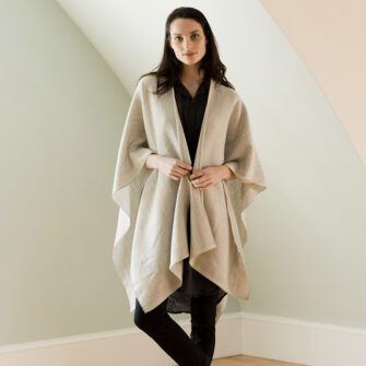Swans Island Company's Katahdin Cape - handwoven in Maine with soft hand-dyed organic merino wool. Show here in Silver Birch.