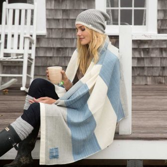 Swans Island Maine Coast Throw is handwoven in Maine with organic merino wool. Shown here in Marine