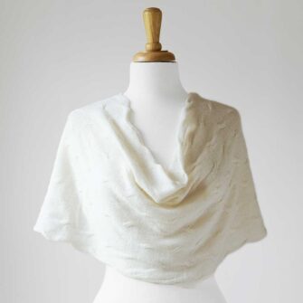 Swans Island Company's Cirrus Cowl is knit with shimmery hand-dyed silk and merino wool. Made in USA. Shown in Ivory,