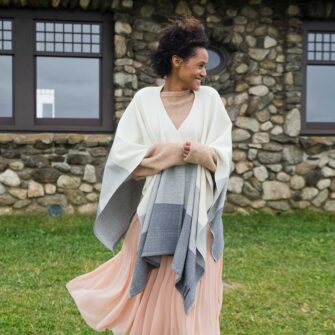 Swans Island Company's Maine Coast Cape. Handwoven in Maine with soft organic merino wool and touch of alpaca. Colors are dyed with all natural dyes. Shown here in Charcoal.