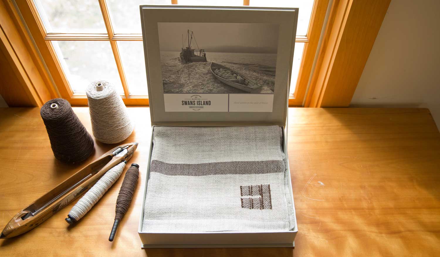 The Swans Island Limited Edition Island Throw comes in our distinctive linen presentation gift box.