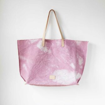 Swans Island's Hana Canvas Boat Bag by Graf Lantz - rugged tie-dyed cotton canvas with leather handles. Shown in Serenity color.