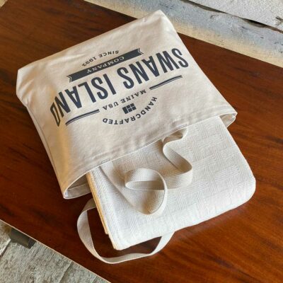 Swans Island Dover Blanket in undyed natural cotton comes in a Swans Island canvas tote bag.