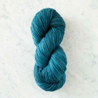 Swans Island Organic Merino Yarn, 100% certified organic Merino wool, hand-dyed in Maine. Color: Agave