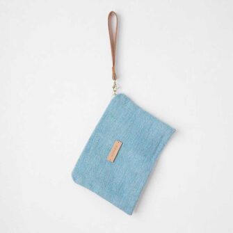 Swans Island's Clutch by Govou is made from upcycled vintage European hemp grain sacks, hand-dyed with all natural indigo dyes.