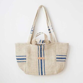 Swans Island's Mini Mami Tote by Govou is made of antique European linen grain sacks upcycled into beautiful modern totes. Each bag is unique.
