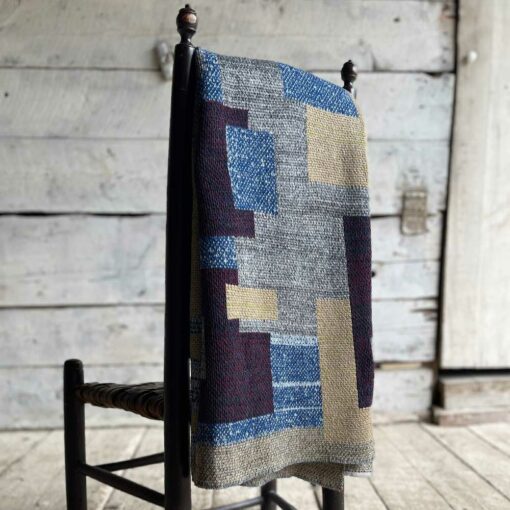 Swans Island's Artisan Patchwork Throw #202 is a one-of-a-kind knit. Made in USA this cozy oversized throw has richly marled yarns. Each one is unique.