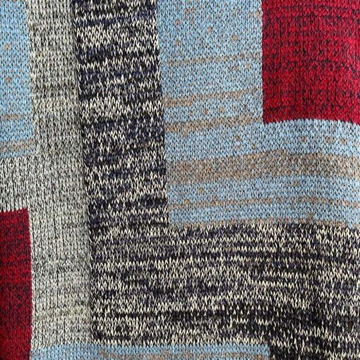 Swans Island's Artisan Patchwork Throw #218 is a one-of-a-kind knit. Made in USA this cozy oversized throw has richly marled yarns. Each one is unique.