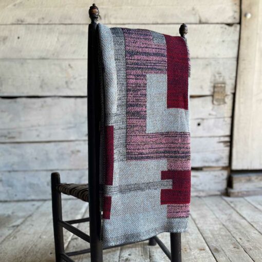 Swans Island's Artisan Patchwork Throw #219 is a one-of-a-kind knit. Made in USA this cozy oversized throw has richly marled yarns. Each one is unique.