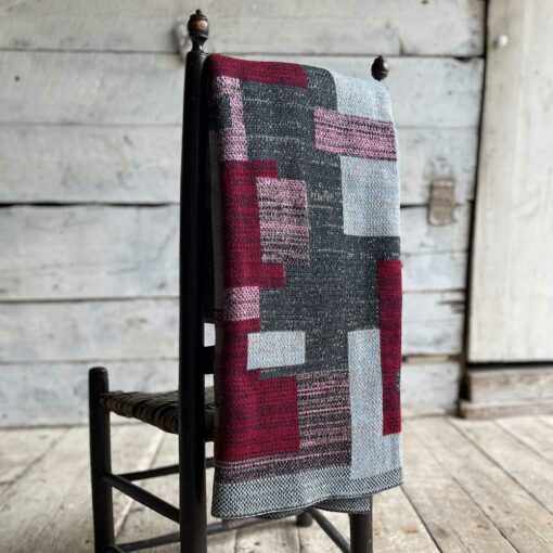 Swans Island's Artisan Patchwork Throw #222 is a one-of-a-kind knit. Made in USA this cozy oversized throw has richly marled yarns. Each one is unique.
