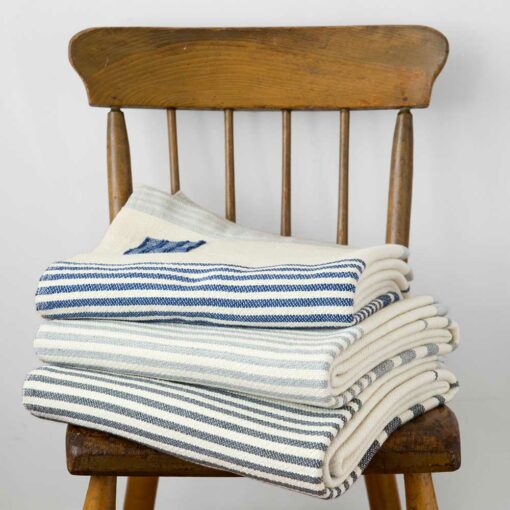 Stillwater Ranch x Swans Island Throw - Ltd. Edition. A collaboration with Chris Pratt and Katherine Schwarzenegger's ranch and Swans Island Co. Kid mohair from Stillwater Ranch is blended with other fine fibers, spun, hand-dyed, handwoven in Maine. Natural with hand-dyed stripes, comes in three colorways.