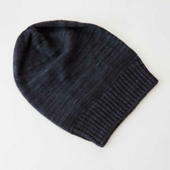 Swans Island Company's Bar Island Hat is knit with soft silk and merino wool. Shown in Raven. 100% made in USA with hand-dyed yarns.
