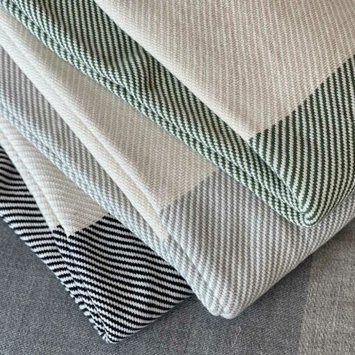 Swans Island's Everyday Cotton Throw blanket is woven in Maine with 100% American cotton.