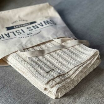 Swans Island's Heavy Cable Throw blanket is woven in Maine with 100% American cotton.