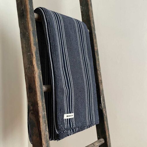 Swans Island's beautifully contrasting Pick Stripe Blanket is woven in Maine with soft, natural cotton.