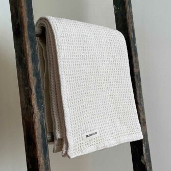 Swans Island's Waffle Knit Throw blanket is woven in Maine with 100% American cotton.