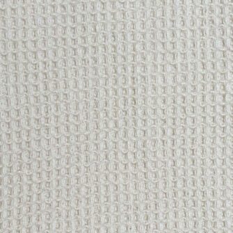 Swans Island's Waffle Knit Throw blanket is woven in Maine with 100% American cotton.