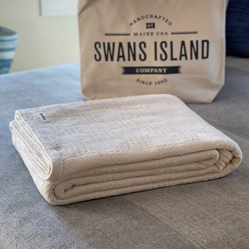 Swans Island's Madison blanket is woven in Maine with 100% American cotton.
