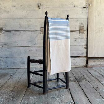 Swans Island's Cotton Penobscot Throw blanket is woven in Maine with 100% American cotton.