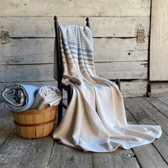 Swans Island's Cotton Penobscot Throw blanket is woven in Maine with 100% American cotton.