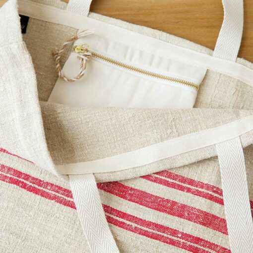 Swans Island Beach Tote by Govou is made from vintage European linen grain sacks. Shown here with red stripes.