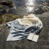 Swans Island Breakwater Throw is woven in Maine with soft organic merino wool and cotton. Inspired by the Maine tides.