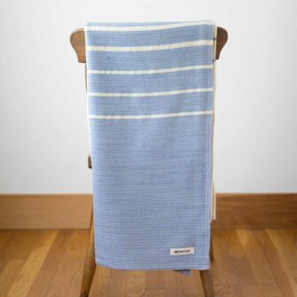 Swans Island Company - Breakwater Throw - made in Maine with soft organic merino wool and cotton. Shown in Wedgwood + Natural stripe.