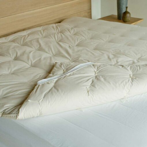 Swans Island Wool Mattress Topper is made in the USA with climate beneficial wool fill.