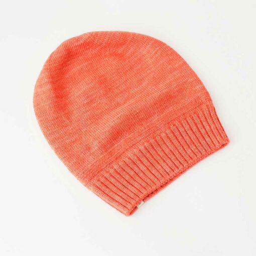 Swans Island Company's Bar Island Hat is knit with soft silk and merino wool. Shown in Persimmon. 100% made in USA with hand-dyed yarns.