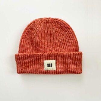 Swans Island Fisherman's Beanie - Knit in USA with soft, hand-dyed silk merino wool shown in Persimmon.