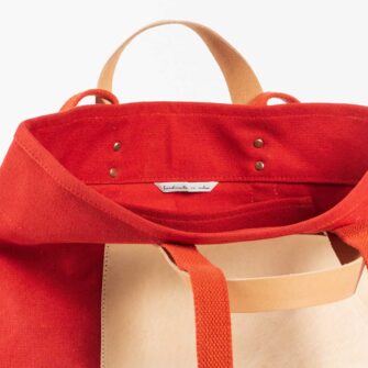 Swans Island Company's Canvas Bucket Tote in heavy cotton canvas with one interior pocket - by Immodest Cotton. Persimmon