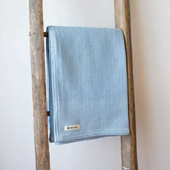 Swans-Island-Bradbury-Throws woven in Maine with 100 % American cotton. Shown here with hemmed edges, in Light Blue