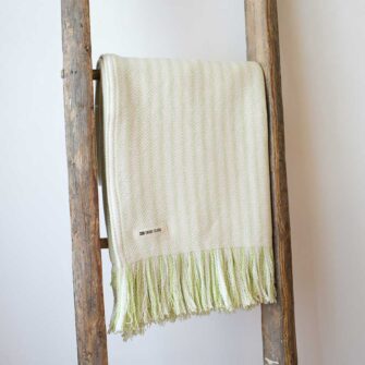 Swans-Island-Cotton Ticking with Fringe-Throws woven in Maine with 100% American cotton. Shown here in Spring Green.