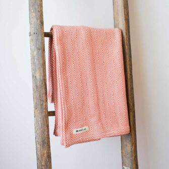 Swans-Island-Cotton Rockport Throws woven in Maine with 100 % American cotton. Shown here in Coral.