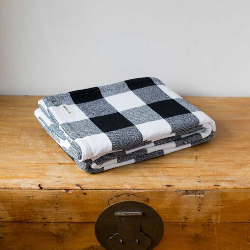 Swans Island Company's Cotton Gingham XL Check Blanket - woven in Maine on antique looms. Made with 100% soft American cotton. Shown here in Black & White.