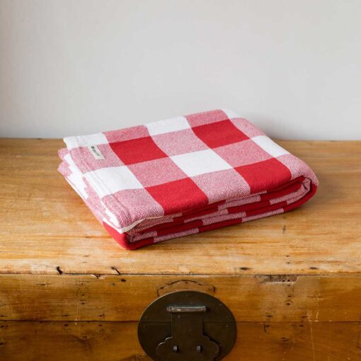 Swans Island Company's Cotton Gingham XL Check Blanket - woven in Maine on antique looms. Made with 100% soft American cotton. Shown here in Red & White.