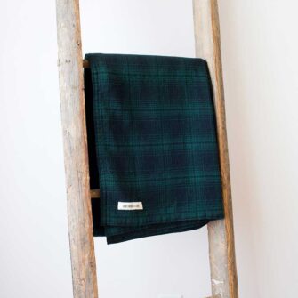 Swans-Island-Oakley Plaid-Throws woven in Maine with 100% Soft wool. Shown here in Green/Black.