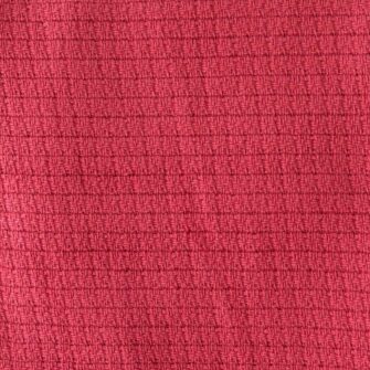 Swans Island Company's Tuscany Cotton Blanket. Soft 100% Cotton blanket woven with an allover basketweave texture. Made in Maine, USA. Shown here in Coral Red. Swatch