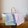Swans Island Company's Gingham Check Baby Blankets. Woven in Maine with soft American cotton yarns in an assortment of colors.