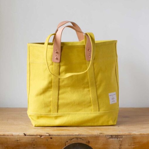 Swans Island Company's Small East West Tote in heavy cotton canvas - by Immodest Cotton. Shown here in Charteuse.