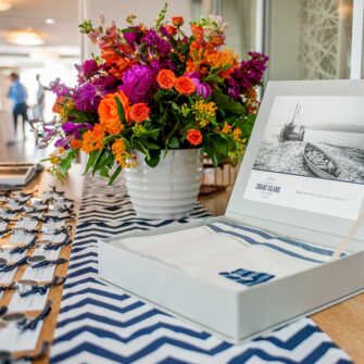 The perfect wedding gift - a Swans Island Company handwoven throw. Comes in our beautiful presentation gift box. Throws can be custom monogramed with initials or a special date, handwoven and hand-stitched in Maine. Shown here is the best-selling Classic Grace Throw with Indigo stripes.