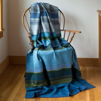 Swans Island & Eric Hopkins Limited Edition Throw 2024. Original painting by Maine artist Eric Hopkins inspires this limited edition handwoven throw by Swans Island Company. Available June 2024.
